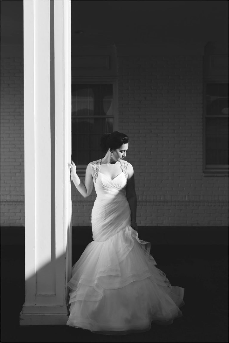bride standing in a shadow at avalon inn warren ohio lindsey yeagley photo