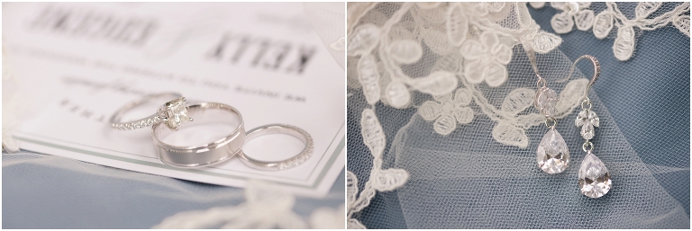 wedding invitation with rings and bridal details